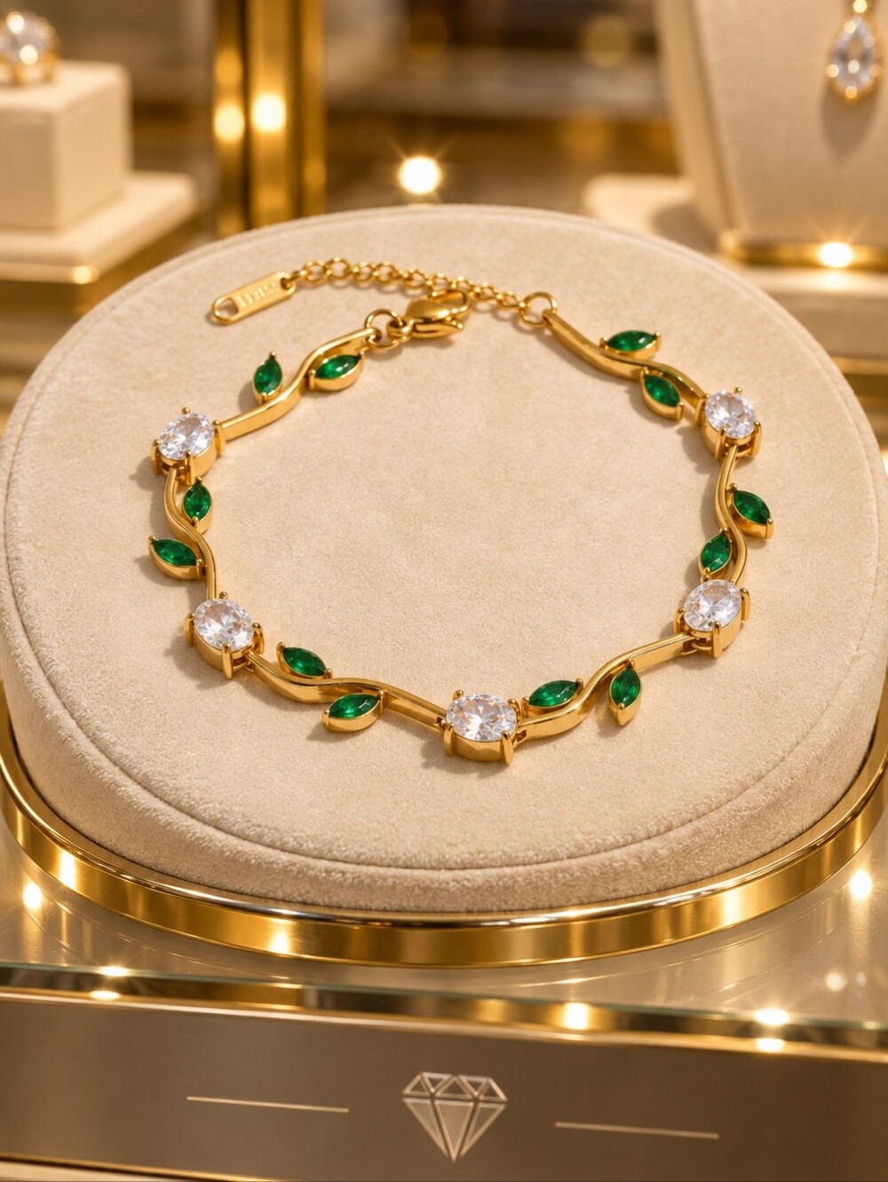 Gold Tone Emerald Leaf Bracelet with Clear Stones
